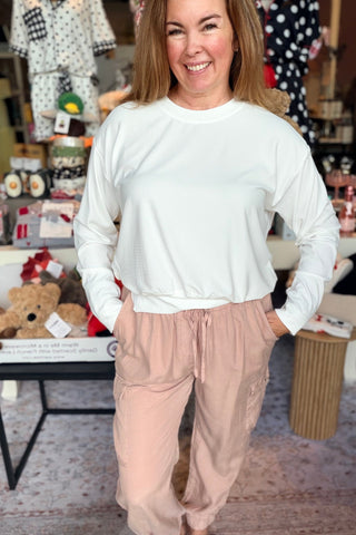 Paula Asymmetrical Hem Sweatshirt | Swank Boutique